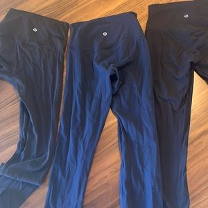 (set of 3) 2 black, 1 navy - Lululemon Align 25” size 4